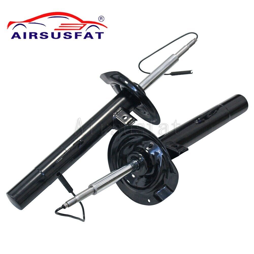A pair of front suspension struts with EDC for BMW E38 740i, 740iL, and 750iL. new, 1995-2001.