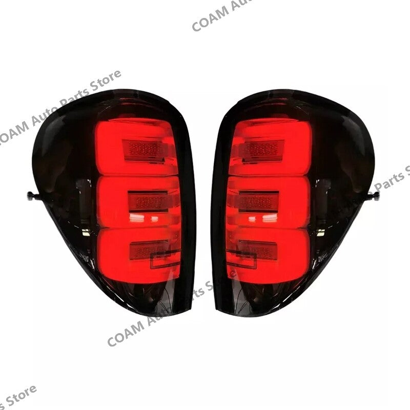 A pair of LED taillights and brake lights for Mitsubishi L200 Triton 2005-2014 (smoked)
