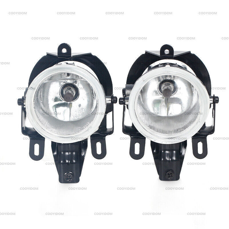 A pair of transparent driving lights for the front bumper fog lights of Pajero Montero 2003-2006.