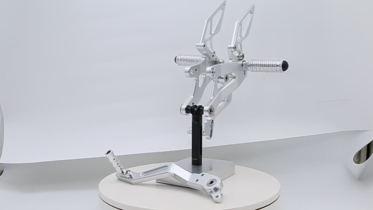CNC geared foot pedals, foot spikes, and footstools are suitable for Zontes 703RR aluminum motors.