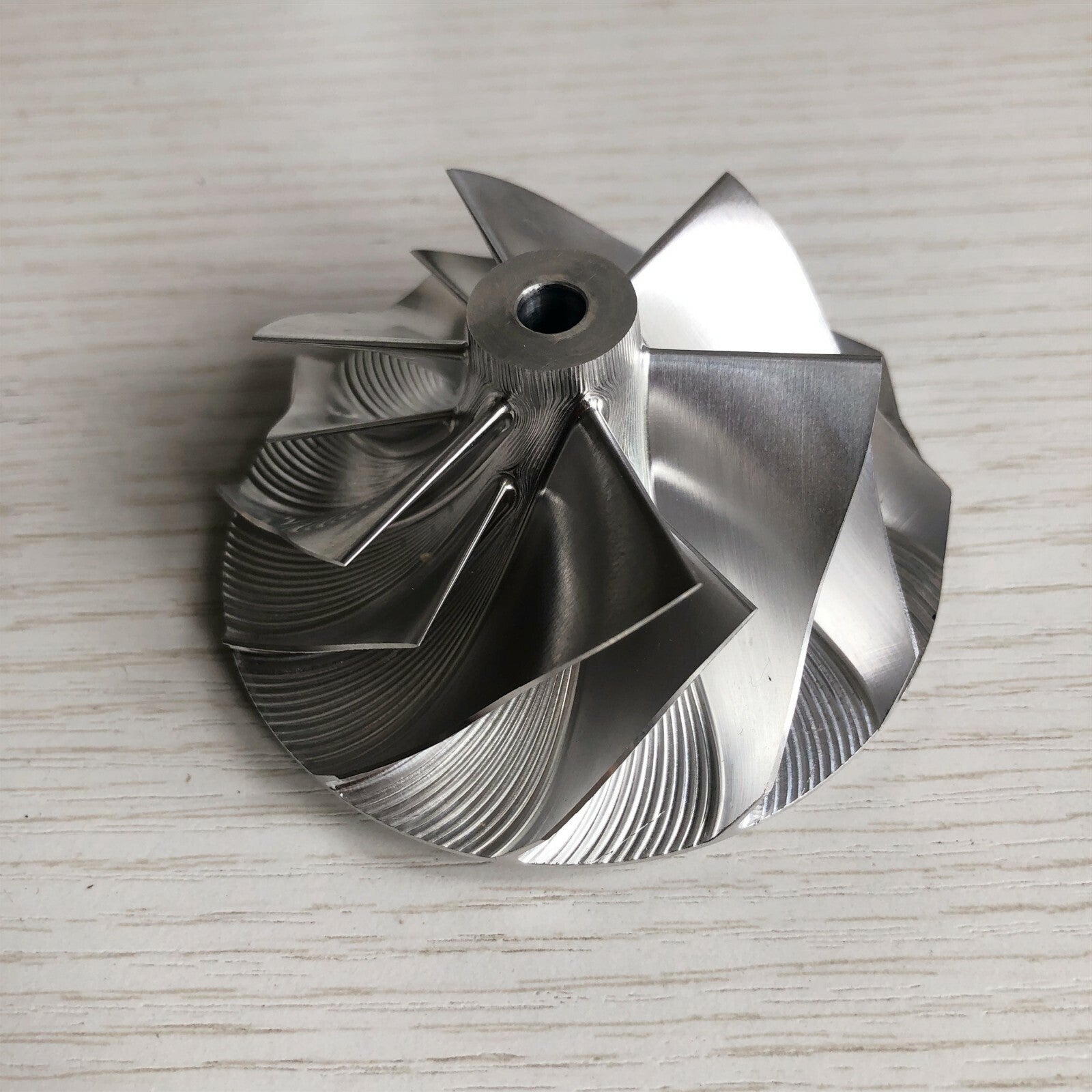 GT3037 Reverse 6+6 Blade 57.04/76.13 mm Bore: 5.99 mm Billet Compressor Wheel
