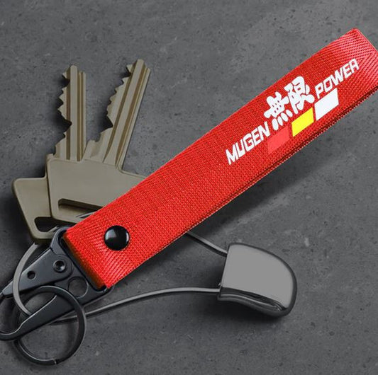 Car keychain metal key ring badge lanyard red Mugan suitable for Nissan