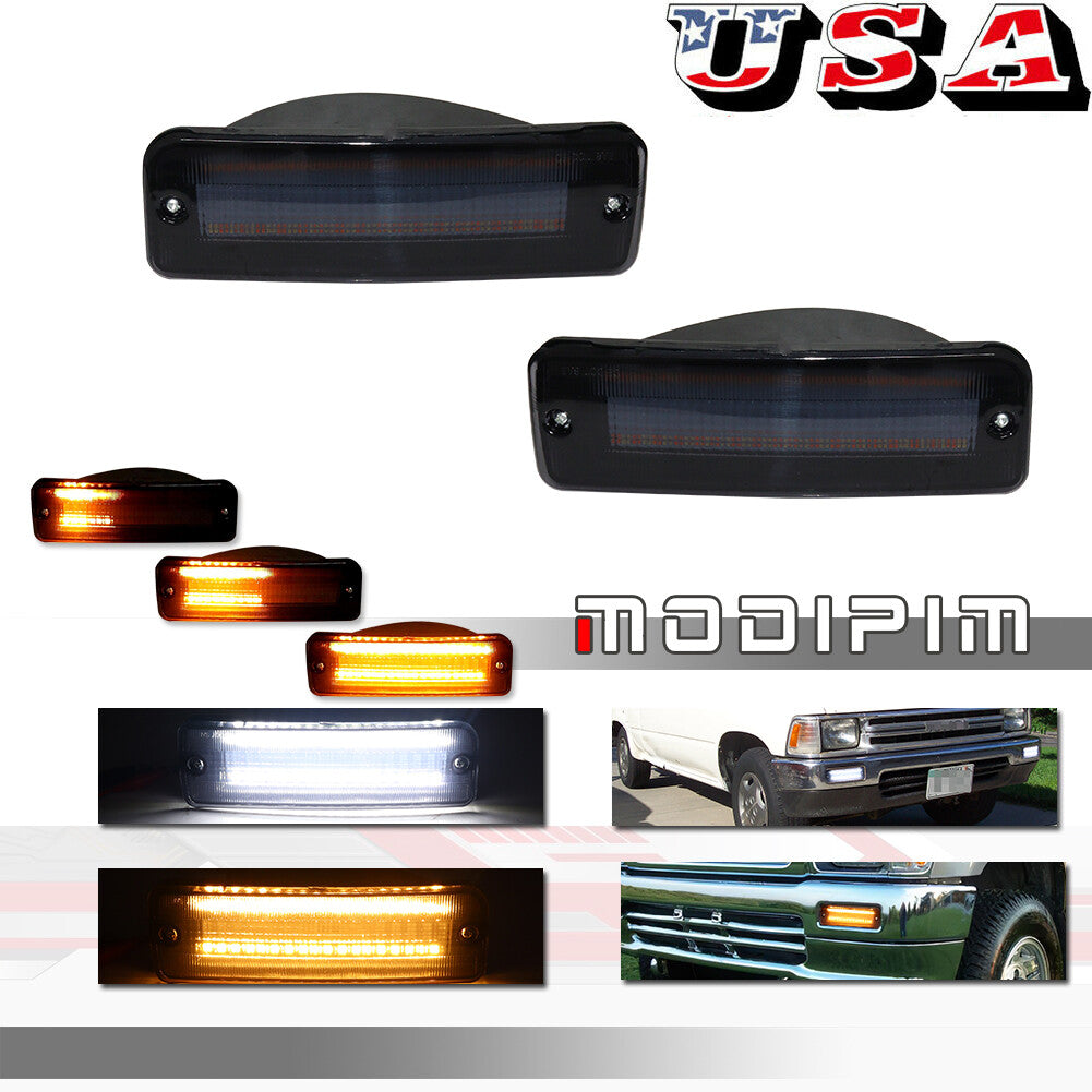 A pair of smoke amber and white LED turn signals suitable for Toyota pickup trucks 89-95 and 90-91 4Runner-.