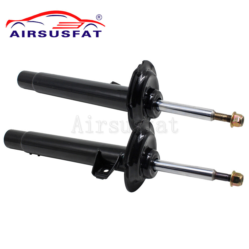 A pair of front shock absorber struts for BMW E46 3 Series RWD (1998-2006)