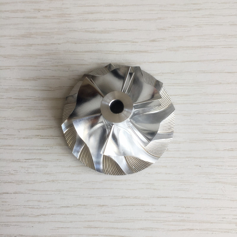 GT15-25 6+6 Blade 702489-0009/6/2 34.62/49.00 mm Turbine Billet Compressor Wheel