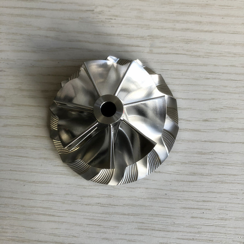 TD05H Reverse 7+7 Insert 49.33/65.00 mm Turbine Milling/Burnt Compressor Wheel
