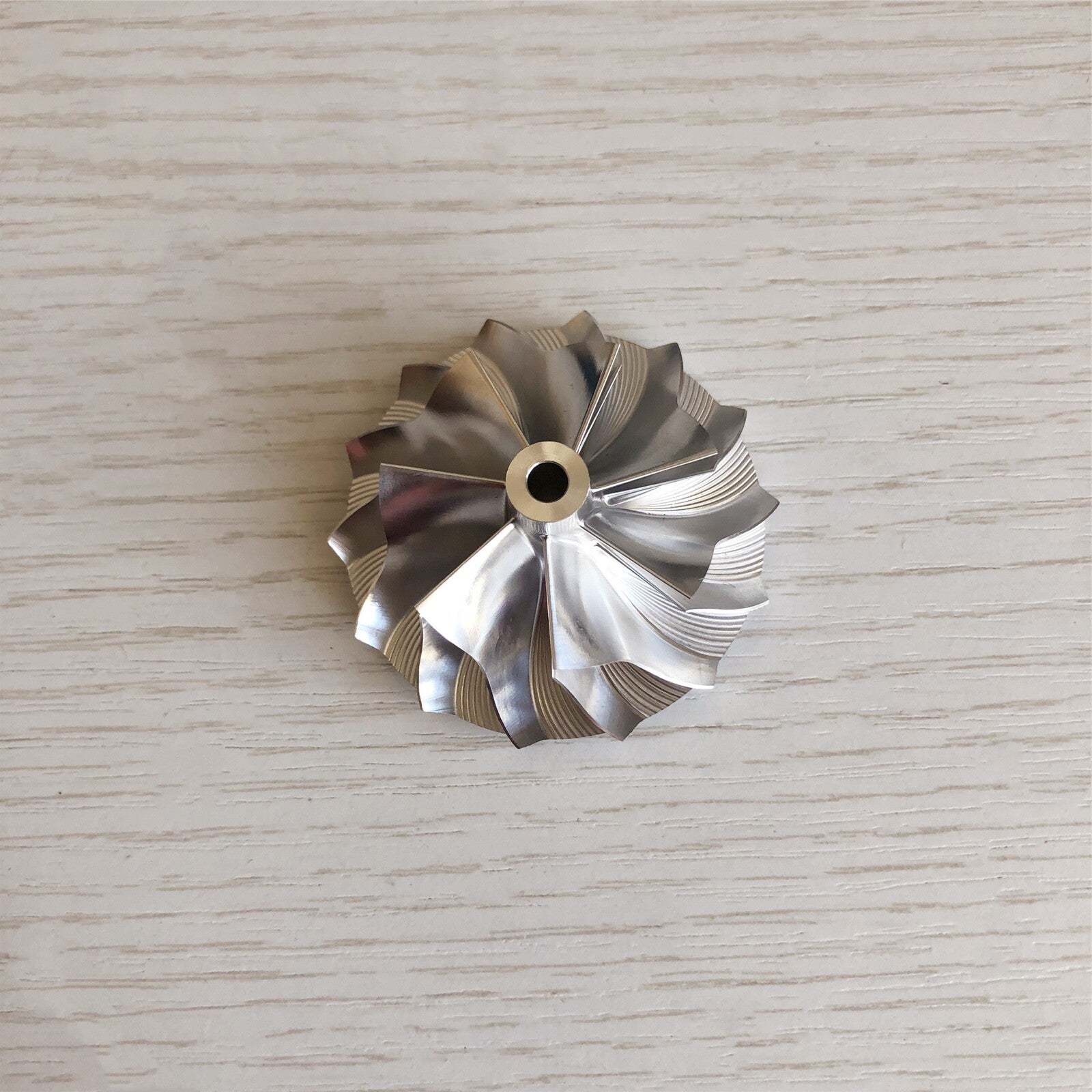 KP39 36.50/49.00 mm 7+7 Blade High-Performance Turbine Billet Compressor Wheel