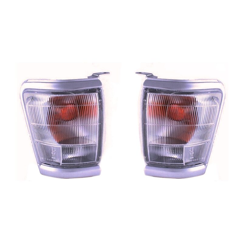 1 pair of headlight and turn signal light trim pieces for Toyota Hilux 1997-2001 vehicles.
