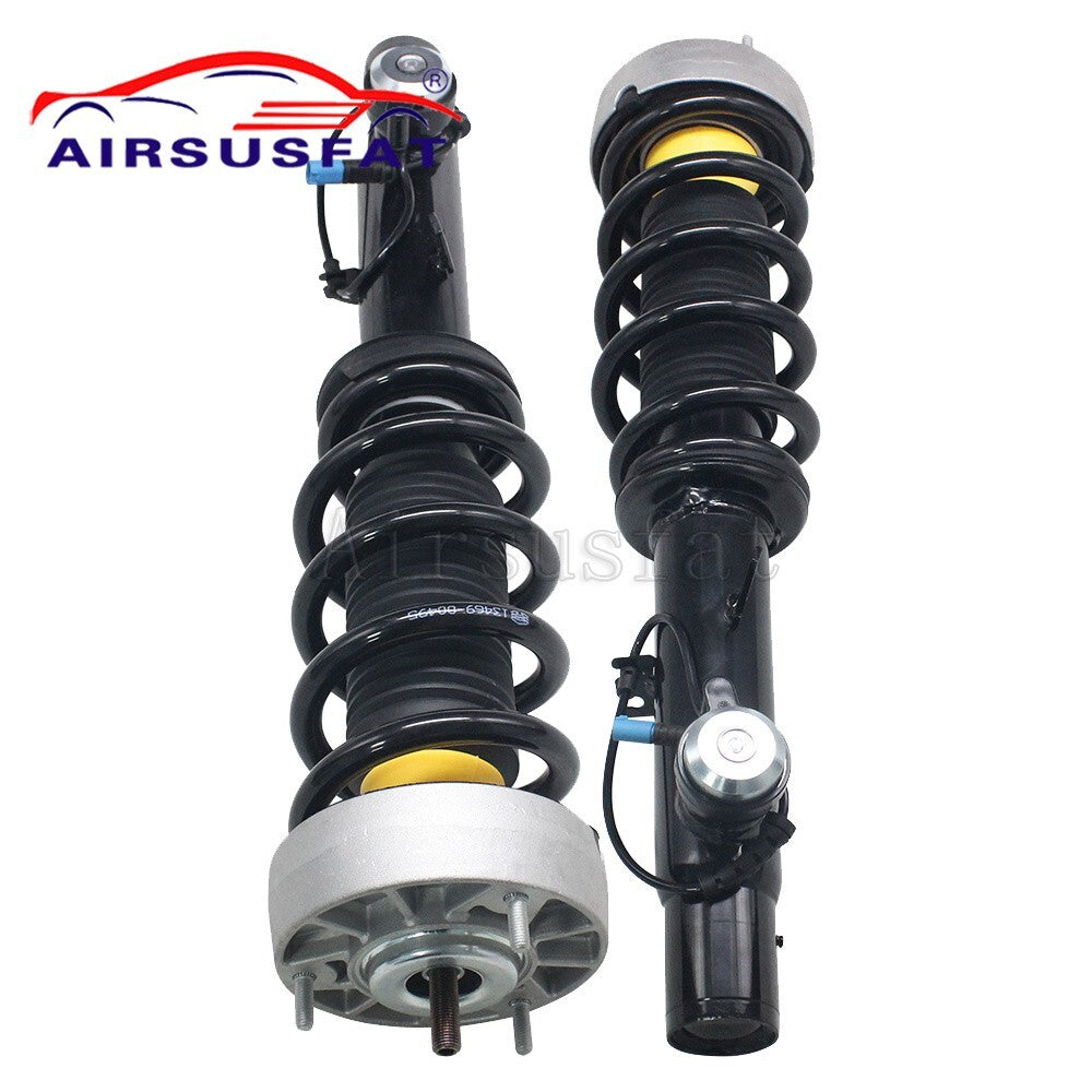 A pair of front shock absorber strut coil spring assemblies with EDC for BMW X5, F15, X6, and F16.