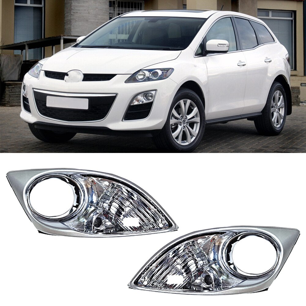 A pair of front bumper fog light protectors without bulbs for Mazda CX-7 (2009, 2010, 2011).